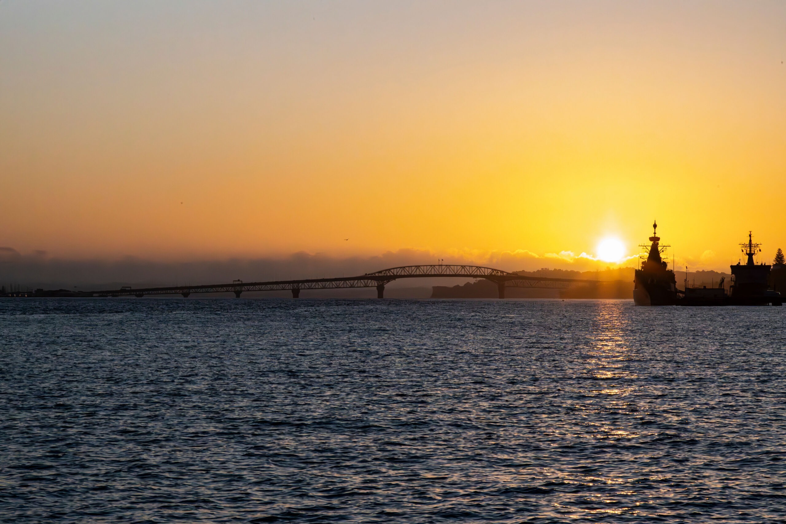 A Round Sun Sinks Low Over The Endless Ocean